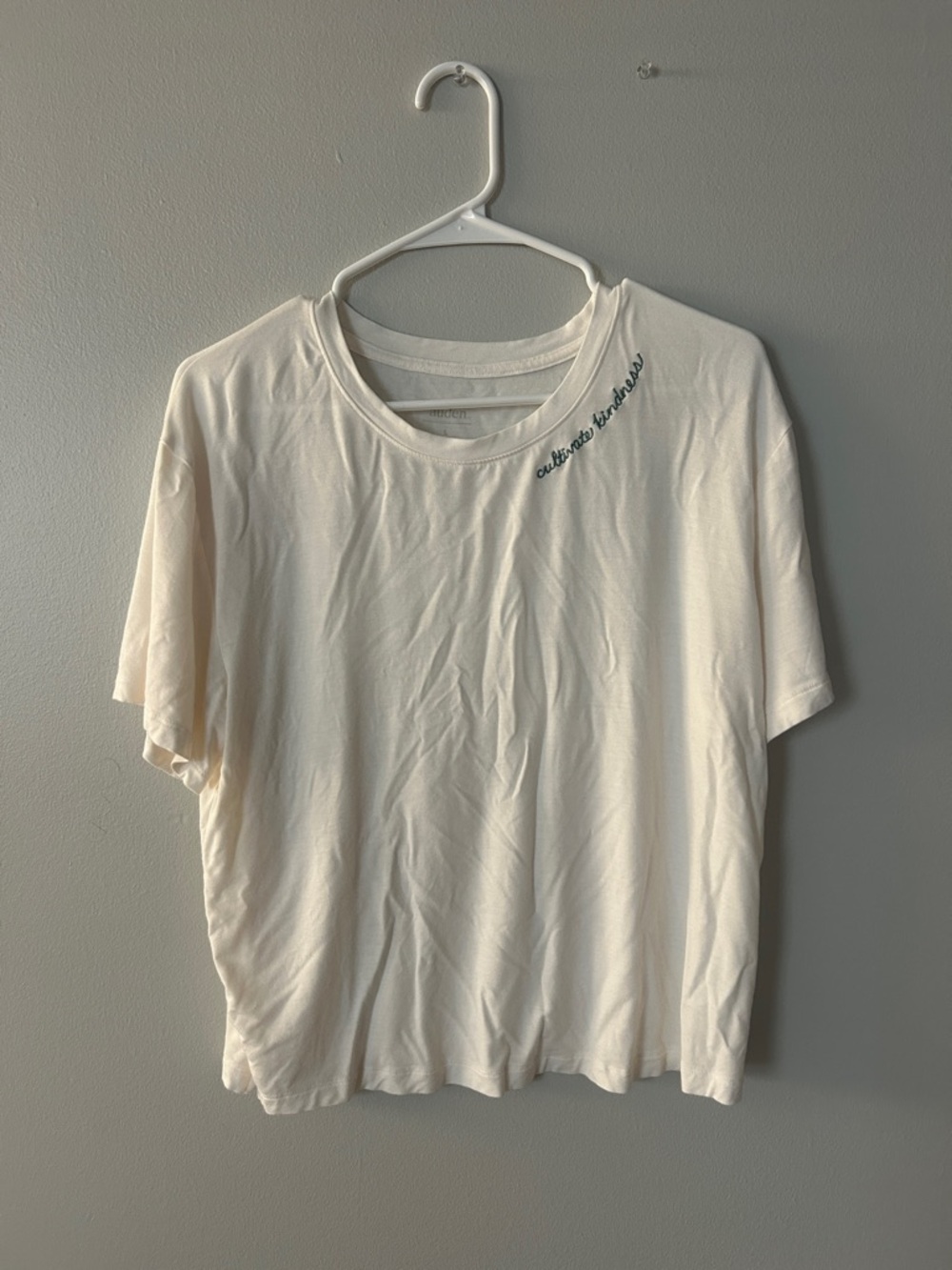 Cream Short Sleeve Women's Tee with Subtle Neckline Script